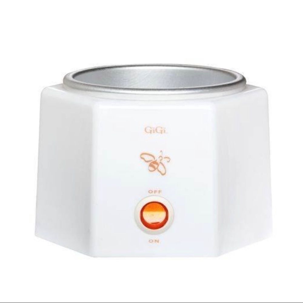 GIGI wax Wamer w/ bag of Gigi  honey wax beads.